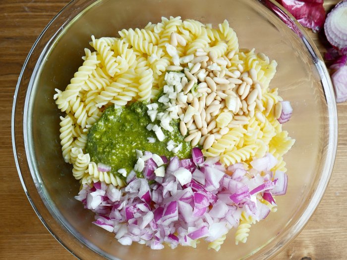 pesto pasta salad ingredients in bowl